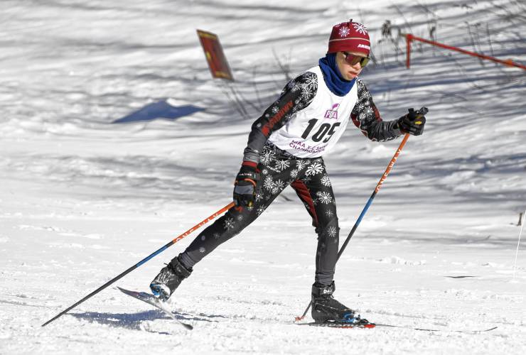 Amherst’s Otis Fairey moves through the course at the MIAA Nordic Ski Championships at Prospect Mountain in Woodford, Vt. on Wednesday.