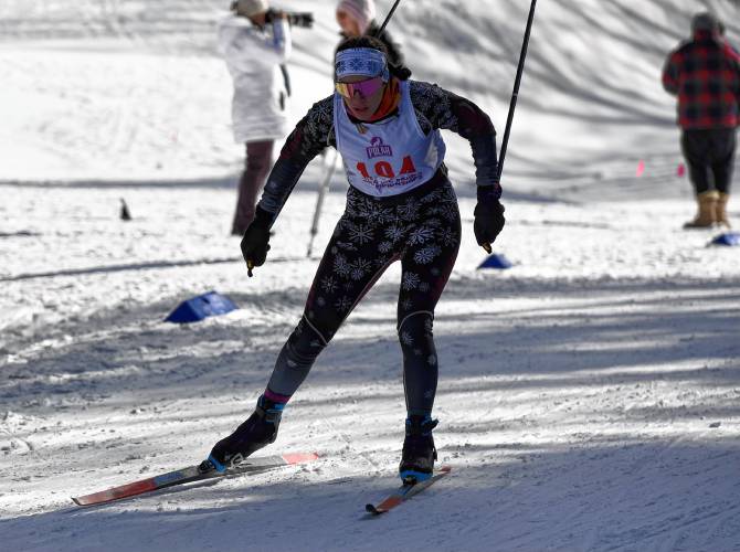 Amherst’s Zoey Candito moves through the course at the MIAA Nordic Ski Championships at Prospect Mountain in Woodford, Vt. on Wednesday.