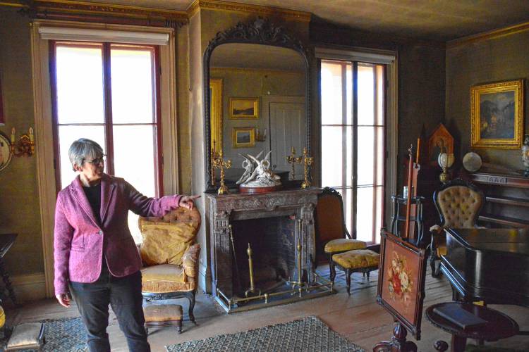 Jane Wald, executive director of the Emily Dickinson Museum, describes some of the 19th-century furnishings and decor in the parlor of The Evergreens. 
