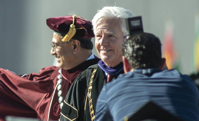 UMass President Martin Meehan takes part in UMass Amherst graduation exercises with former Chancellor Kumble Subbaswamy on May 13, 2022.