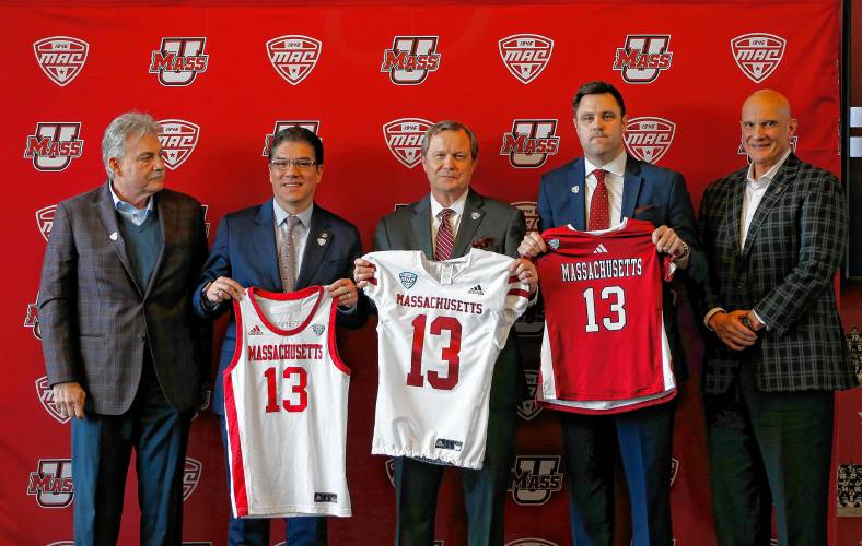 From left, UMass football head coach Don Brown, Chancellor Javier Reyes, MAC commissioner Dr. Jon Steinbrecher, Director of Athletics Ryan Bamford and men’s basketball head coach Frank Martin during a press conference at the Martin Jacobson Football Performance Center on Thursday regarding the University of Massachusetts joining the Mid-American Conference.