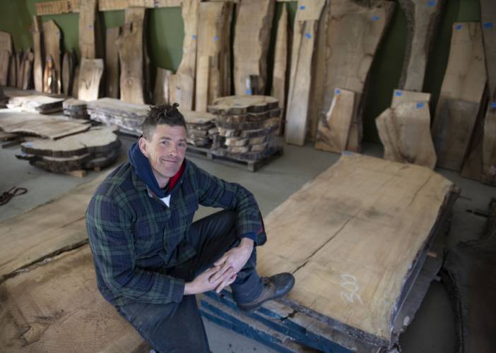 Nick Simmons, owner of Hadley Mill Works, at his business, where he sells live edge wood to professional and amateur carpenters, as well as artists. “They all come to me because they want to build stuff,” Simmons said. “The beauty is the natural wood.” 