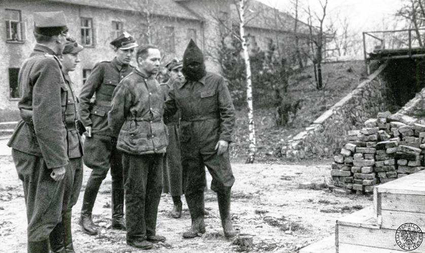 Rudolph Höss, the commandant of Auschwtiz, is escorted to a gallows in 1947, erected just outside the former concentration camp in southern Poland.